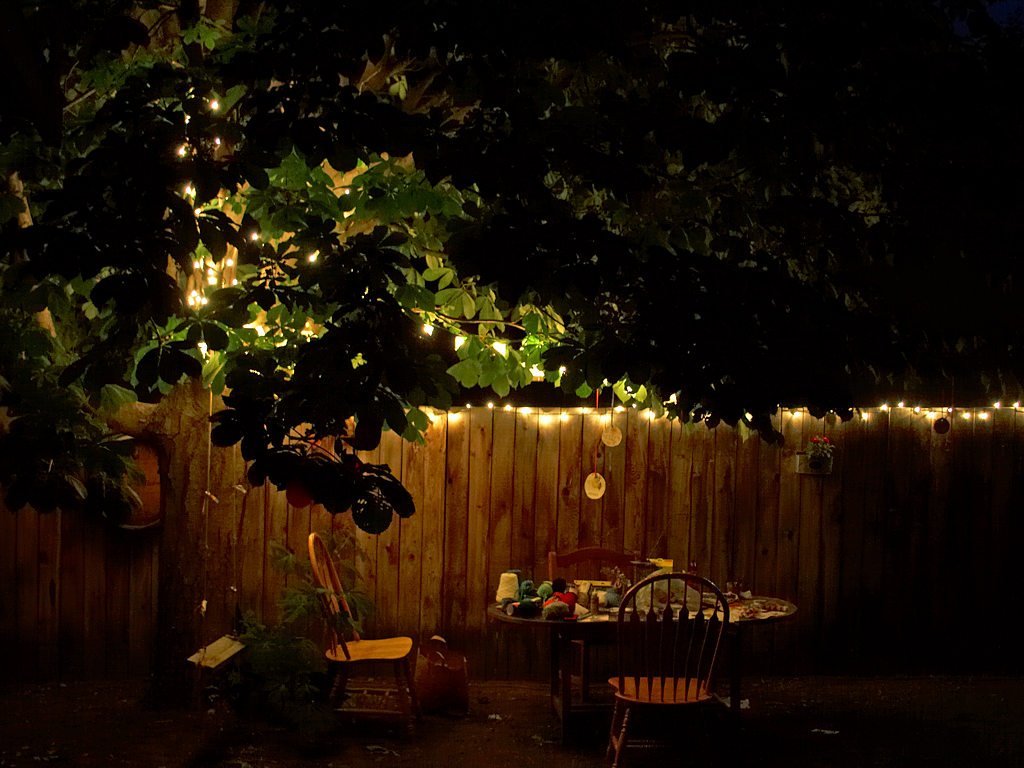 Hardscape ideas for small backyards - Use lighting strategically